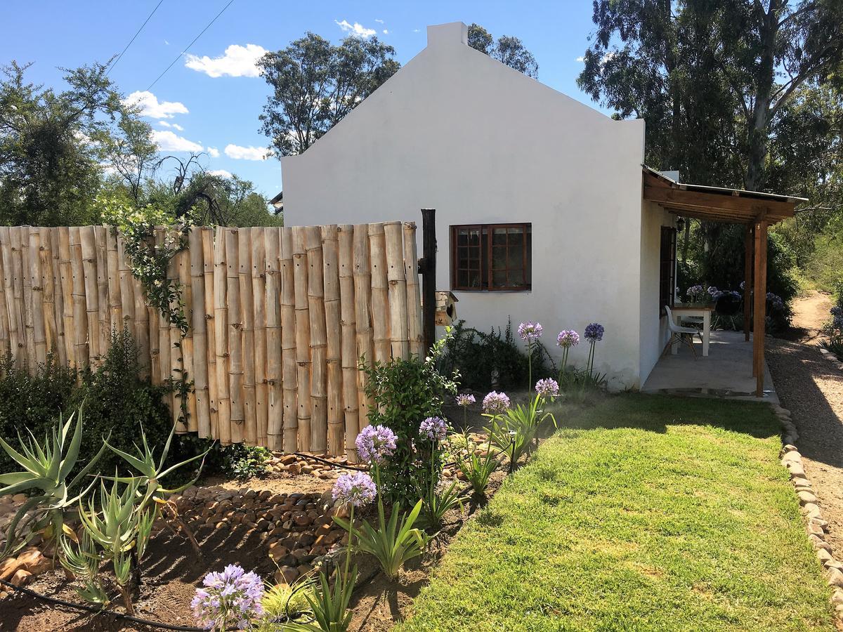 אדו Riversong Cottages מראה חיצוני תמונה